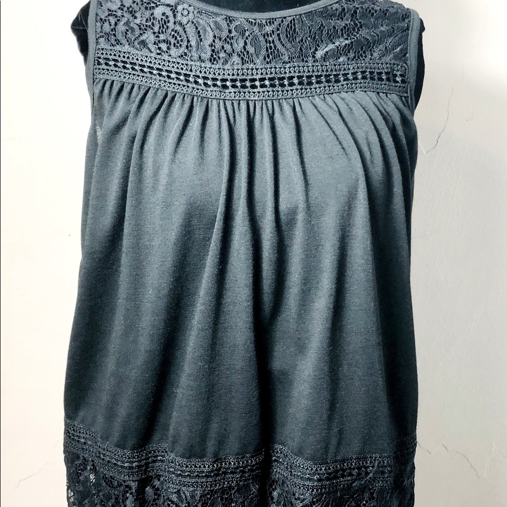 Woman’s cute top size M/L.crochet open back